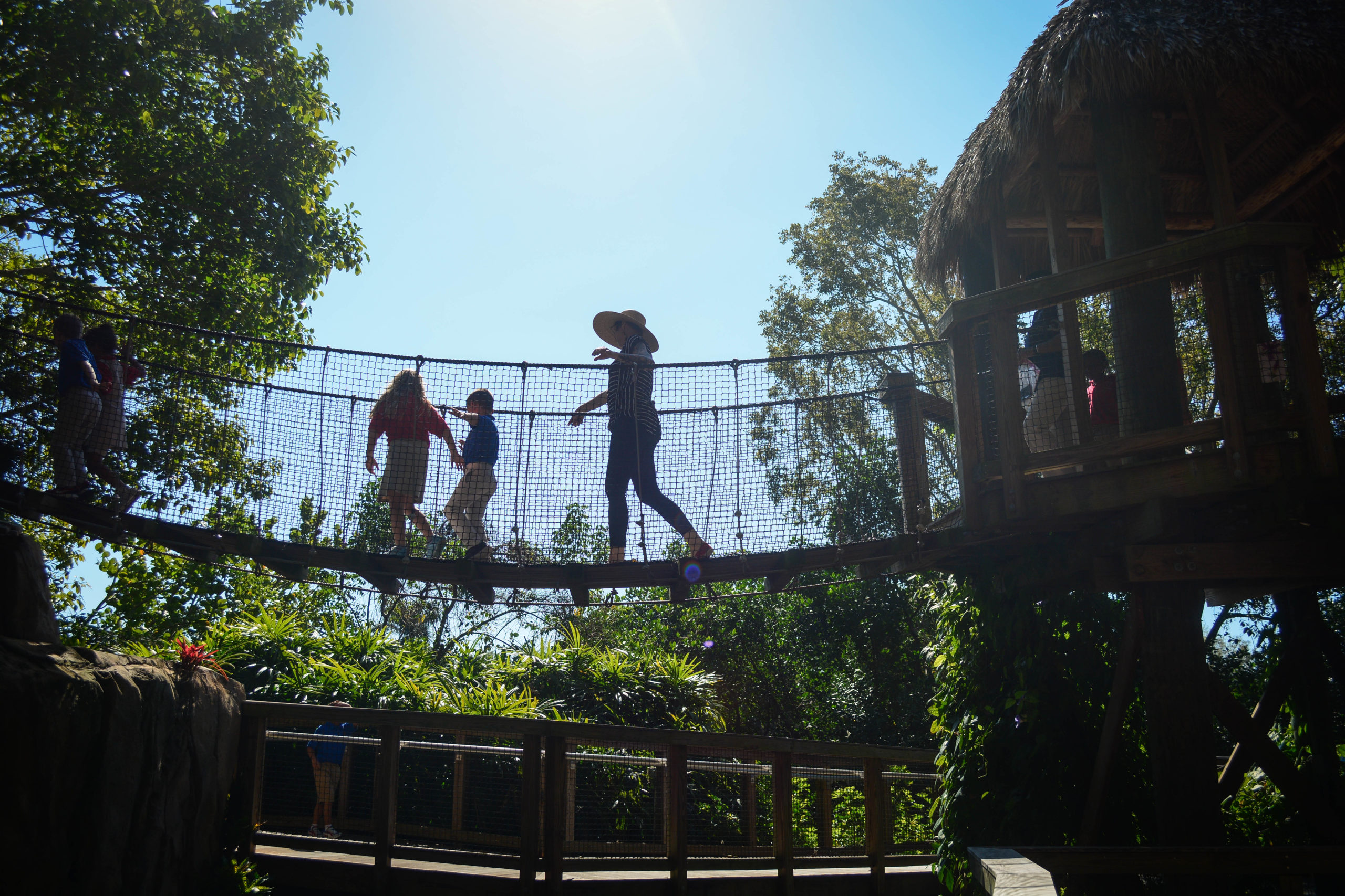 Children walking across bridge