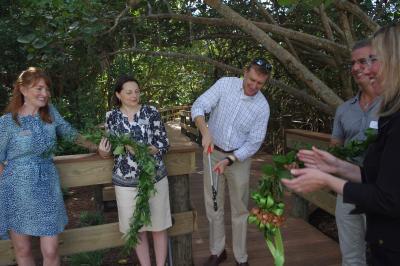 Chair Emily Walsh, Trustee J. Alison Archbold, Jeff Steinwachs, Trustee Dr. Kelvin Cooper and President and CEO Jennifer O. Rominiecki reopen the Mangrove Walkway. 